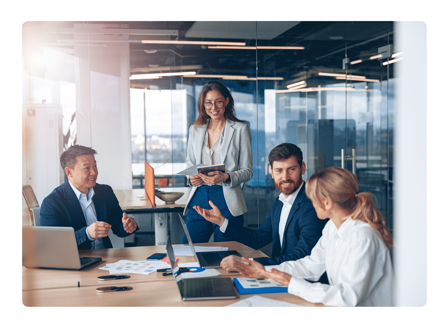 Employees working together discussing plans